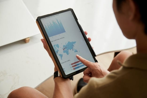 A close-up shot of a hand using a digital tablet to analyze rental market data, with charts and graphs showing trends in rental prices in a specific area.