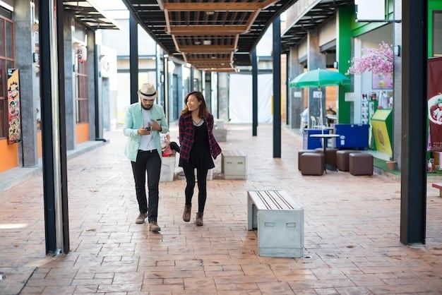 A vibrant city center with people walking and shopping. Modern buildings and green spaces are visible, along with public transportation options.