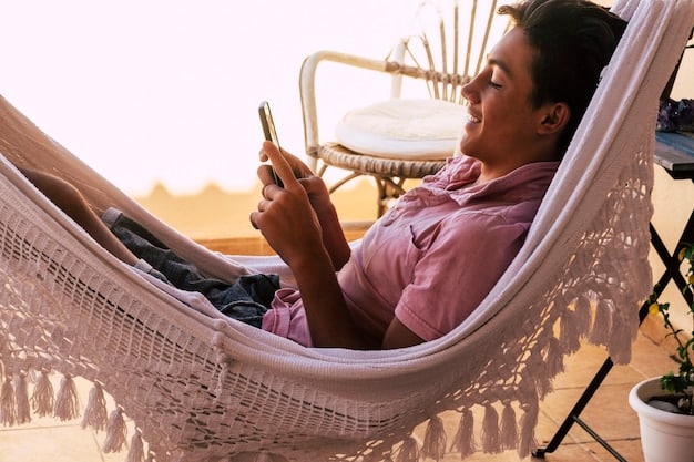 A person happily checking their phone, seeing a notification of passive income earnings while lounging in a hammock.